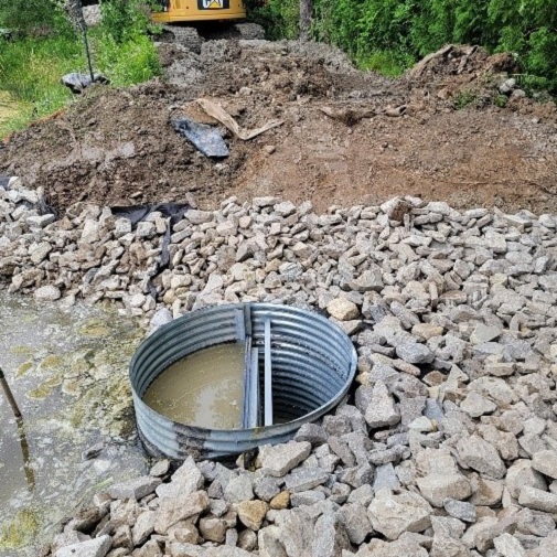 TRCA team members decomission dam to restore channel and wetland in Caledon