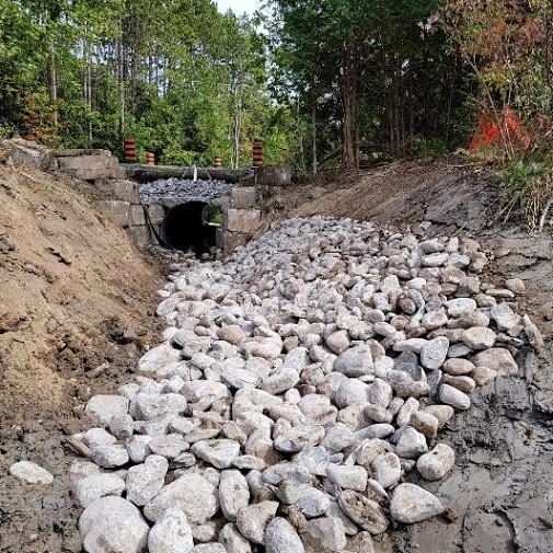 TRCA team members decomission dam to restore channel and wetland in Caledon