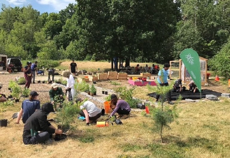 Conservation Youth Corps volunteers plant trees for the childrens garden at Claireville