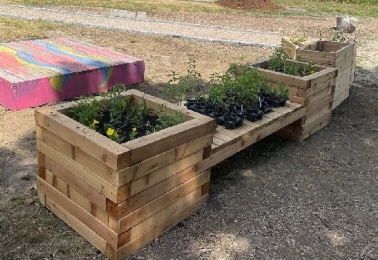 Planter boxes installed at Claireville Conservation Area childrens garden by Girls Can Too participants
