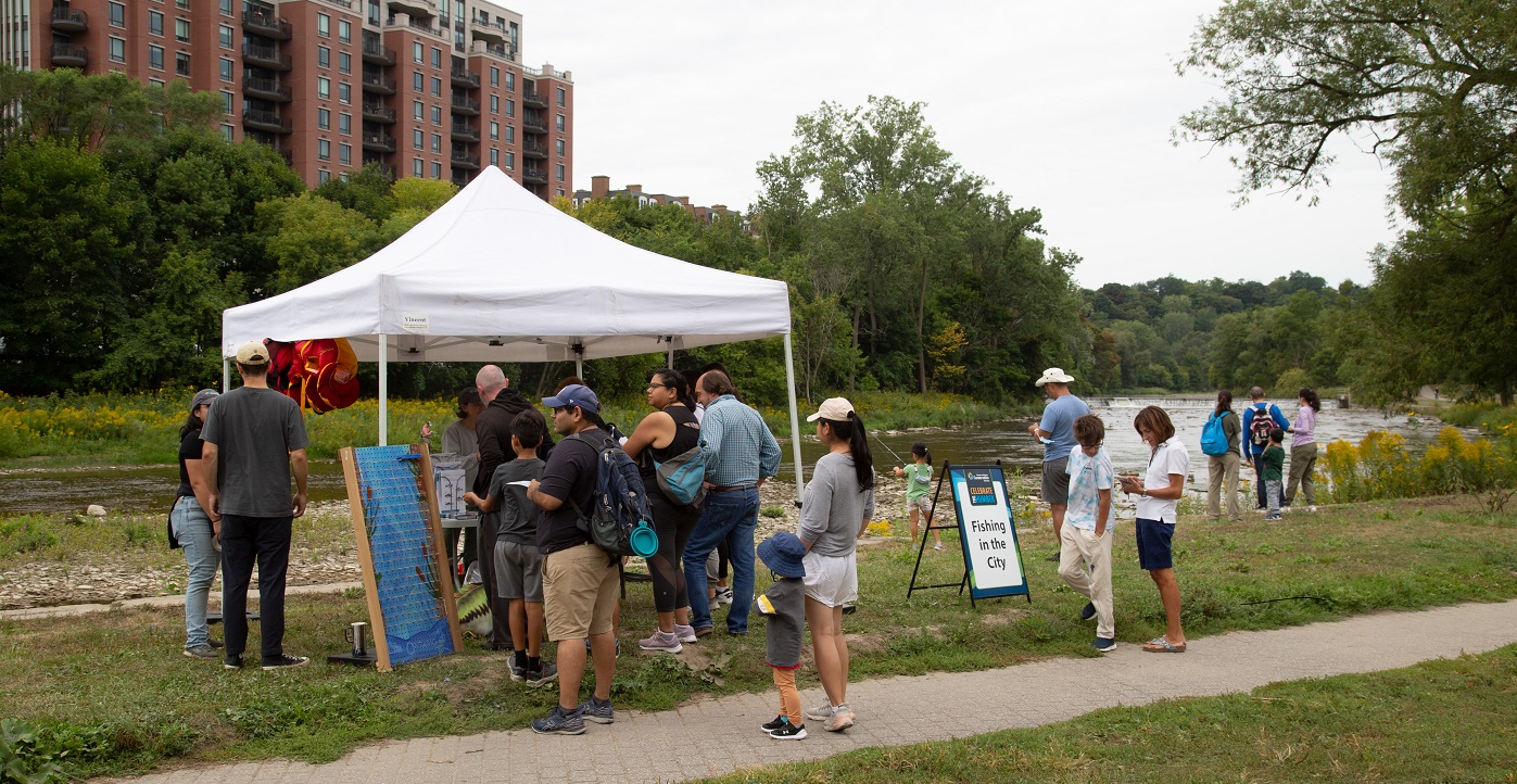 visitors to the TRCA Celebrate the Humber event stop at interactive educational stations