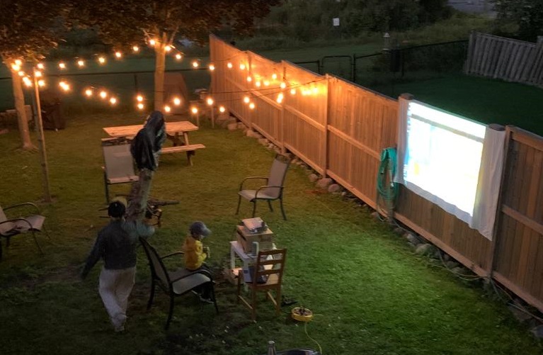 Summer Challenge winners organizes a backyard movie night
